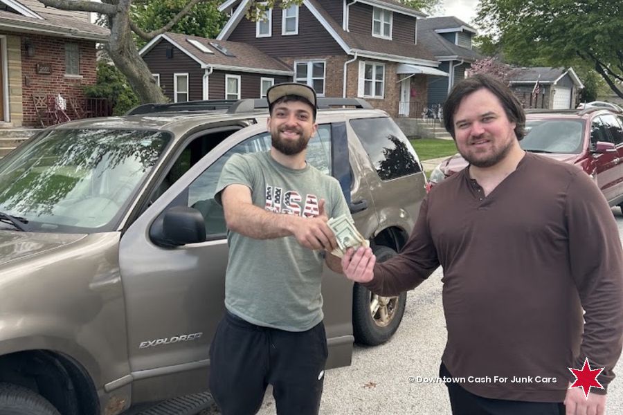 Paying cash for a Ford Explorer on a Chicago street